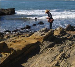 RosalieLookingDownatRocks